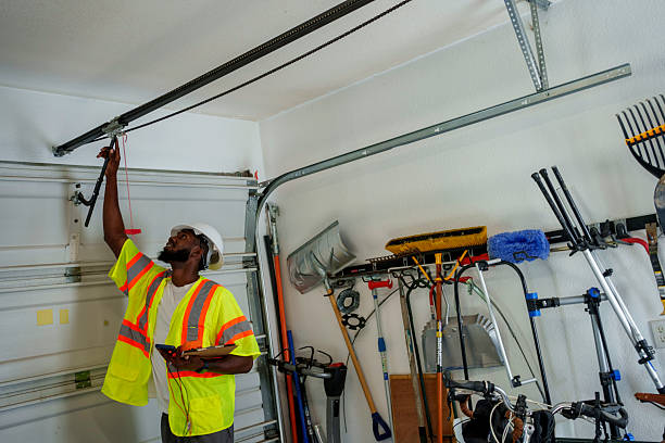 Professional Garage Door Panel Replacement technician working in Woodson County County, KS